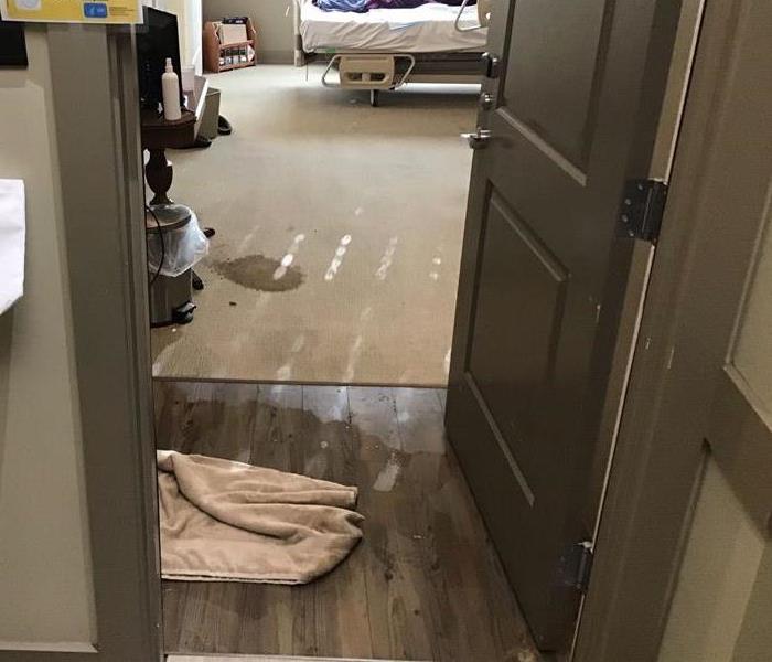 A Barrow County hospital room with water damage.